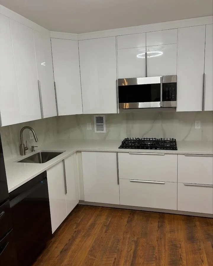 Restored kitchen with white cabinets after water damage in North Riverside